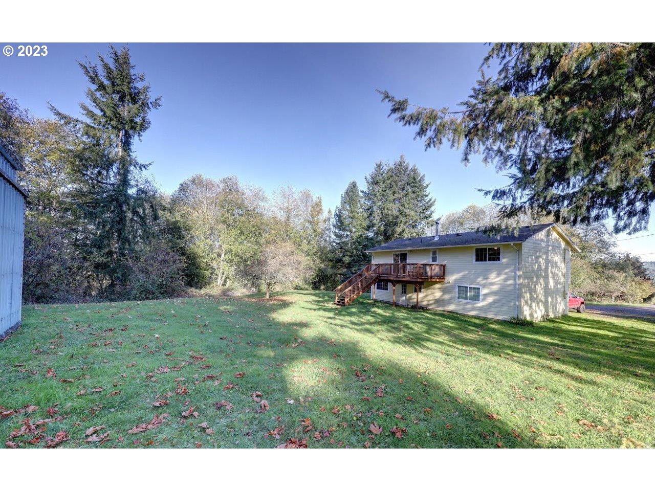 93066 Knappa Dock Road Astoria, OR 97103 - Photo 2 of 29 a view of a house with a big yard