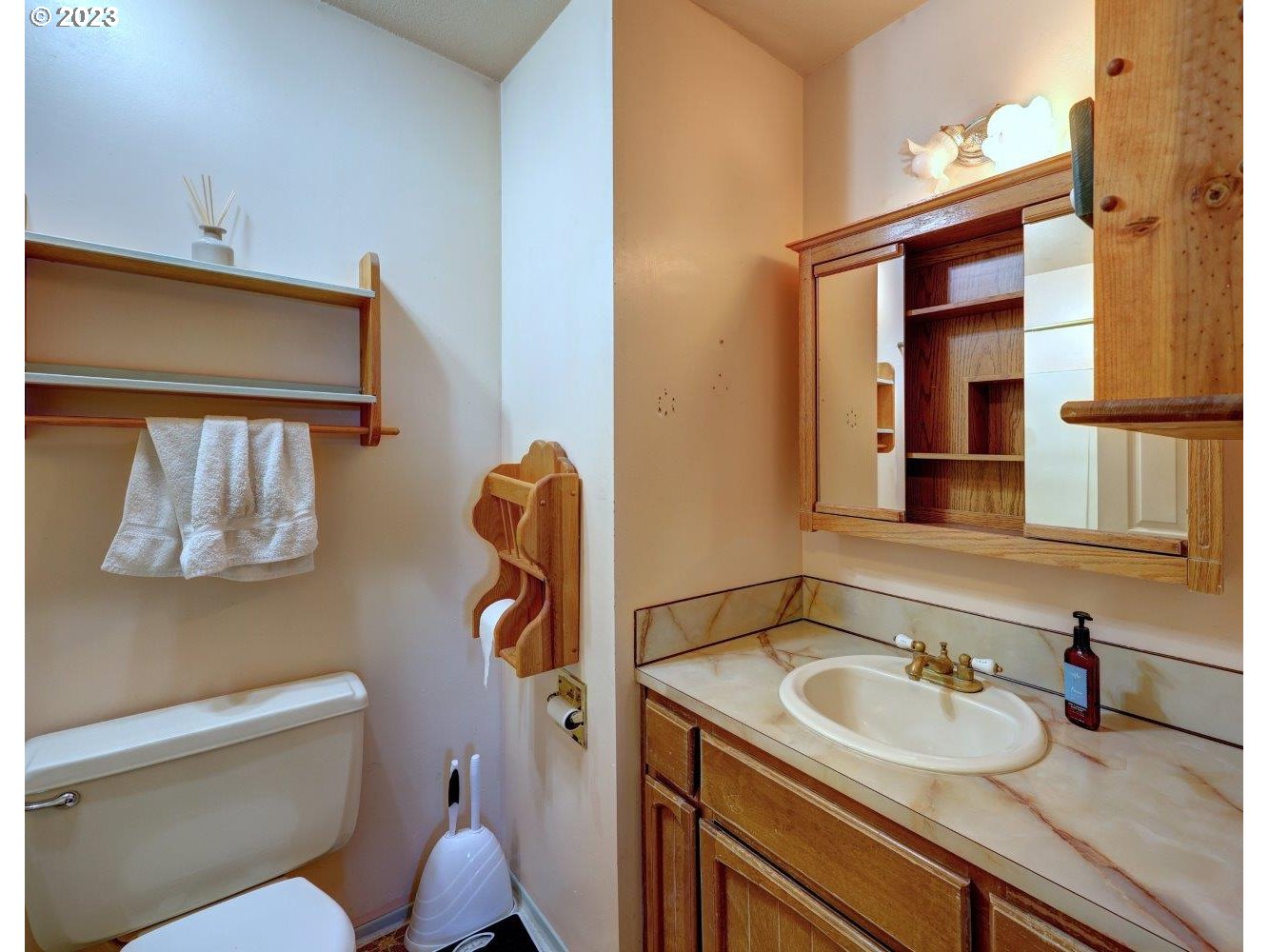 93066 Knappa Dock Road Astoria, OR 97103 - Photo 21 of 29 a bathroom with a sink and a toilet