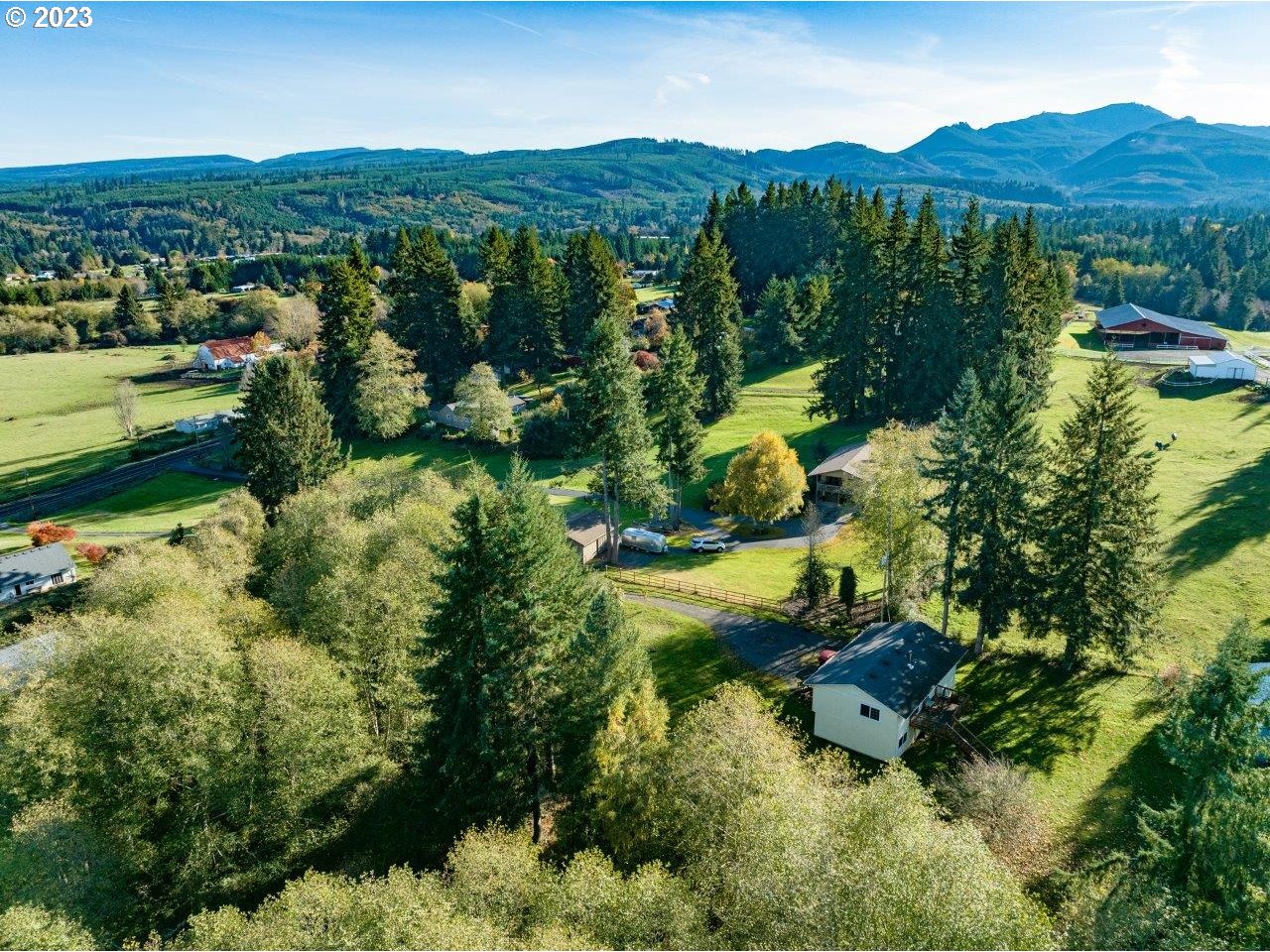93066 Knappa Dock Road Astoria, OR 97103 - Photo 8 of 29 an aerial view of residential house with outdoor space and trees all around