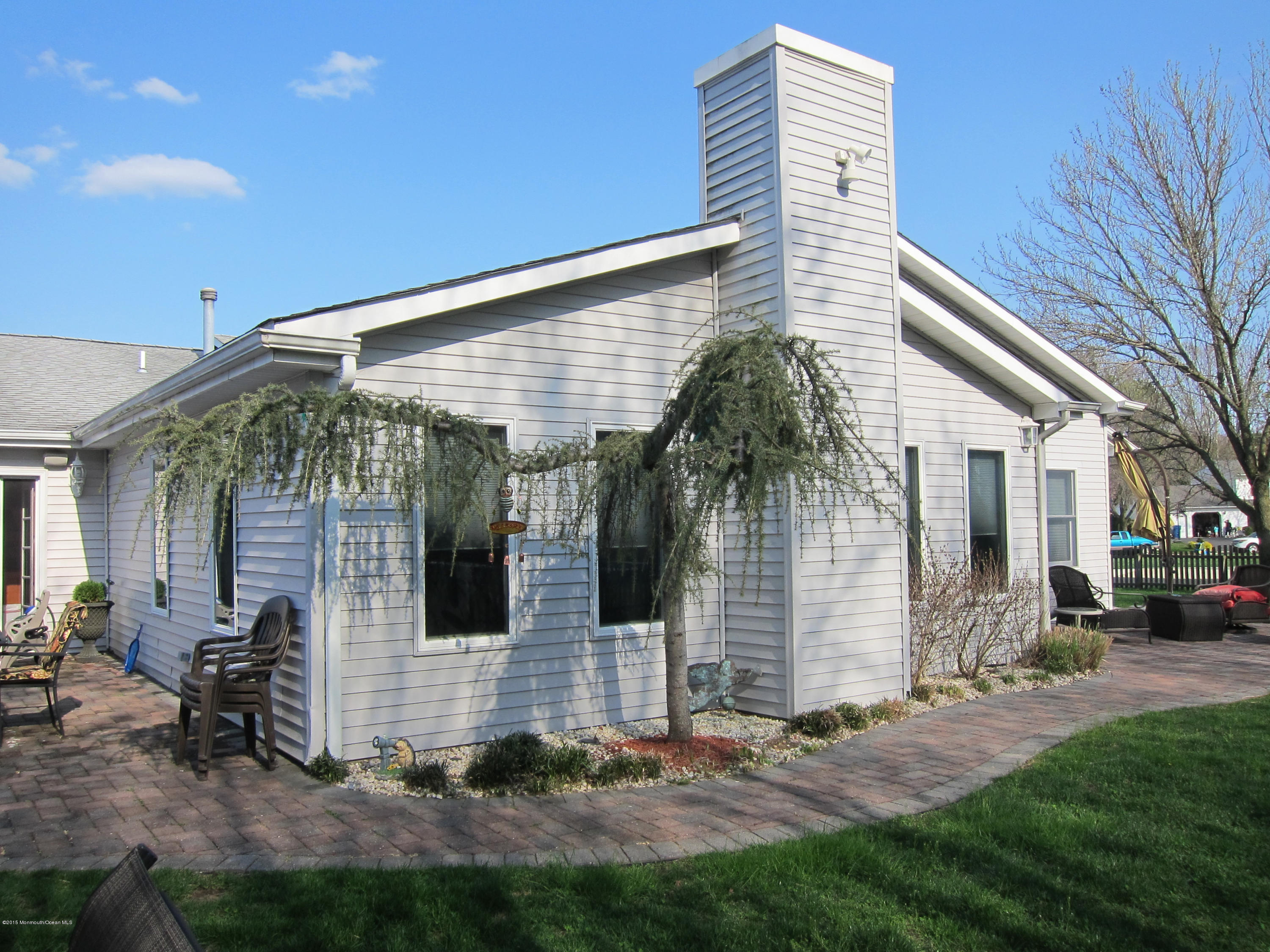 121 Starlight Road Howell, NJ 07731 - Photo 17 of 19 GREAT ROOM OUTSIDE