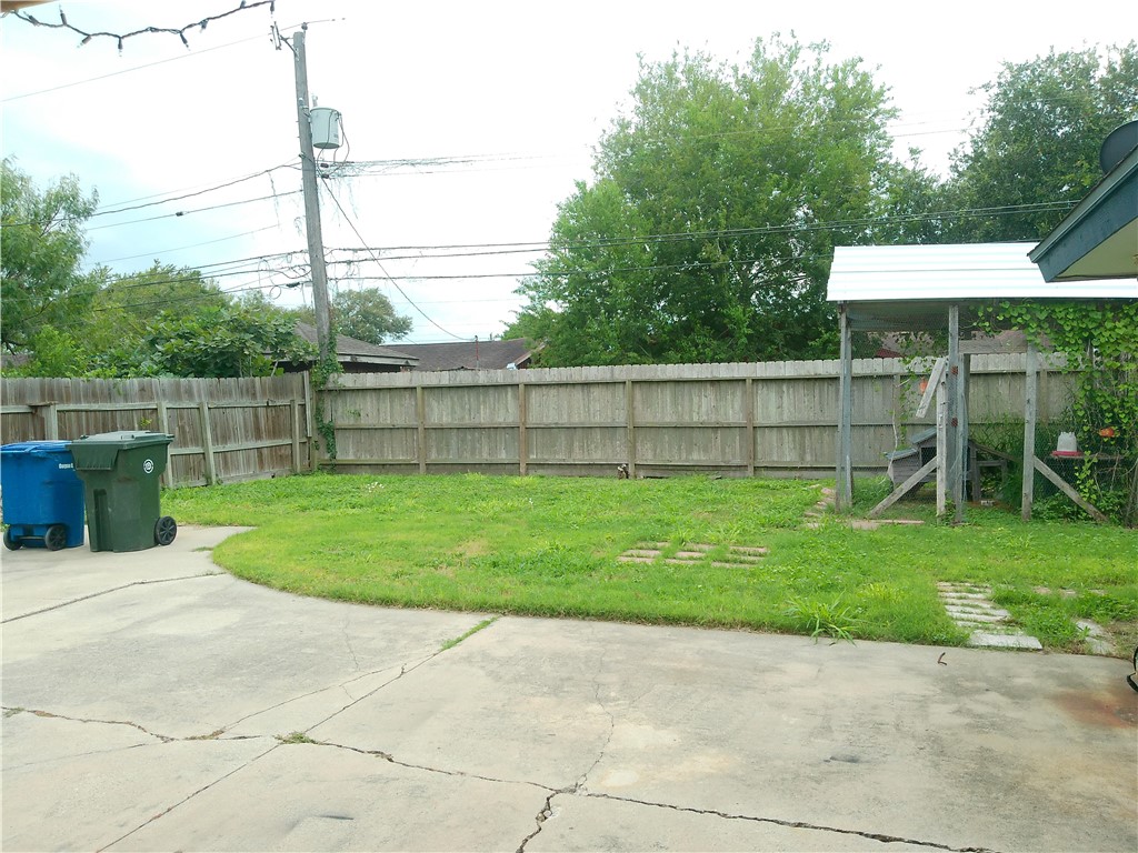 4117 Monaco Street Corpus Christi, TX 78411 - Photo 16 of 17 a view of backyard with seating area and green space