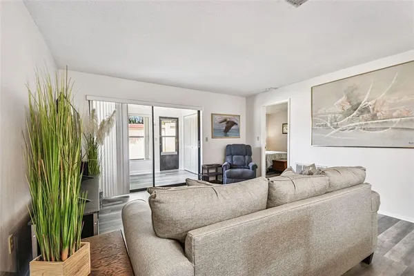 a view of walk in closet with clothes