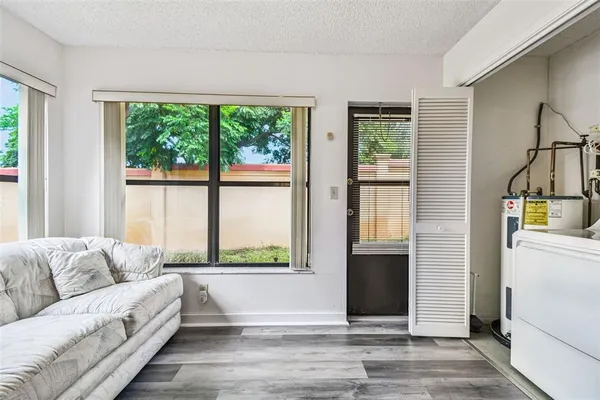 an aerial view of a house with outdoor space pool seating area and fire pit