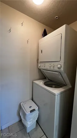 a view of bathroom with a toilet and a sink