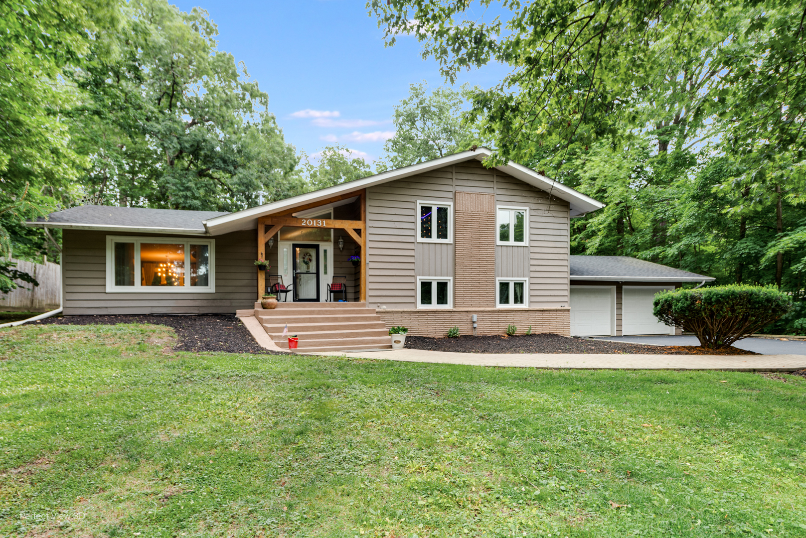 20131 East Brightway Road Mokena, IL 60448 - Photo 1 of 26 a front view of house with yard and green space