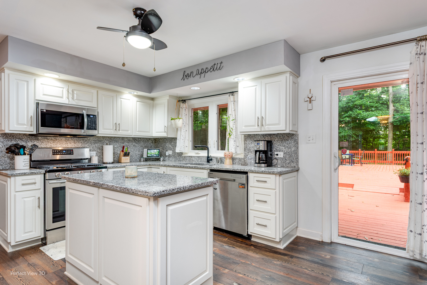 20131 East Brightway Road Mokena, IL 60448 - Photo 6 of 26 a kitchen with stainless steel appliances granite countertop white cabinets a sink a stove a refrigerator and microwave with wooden floor