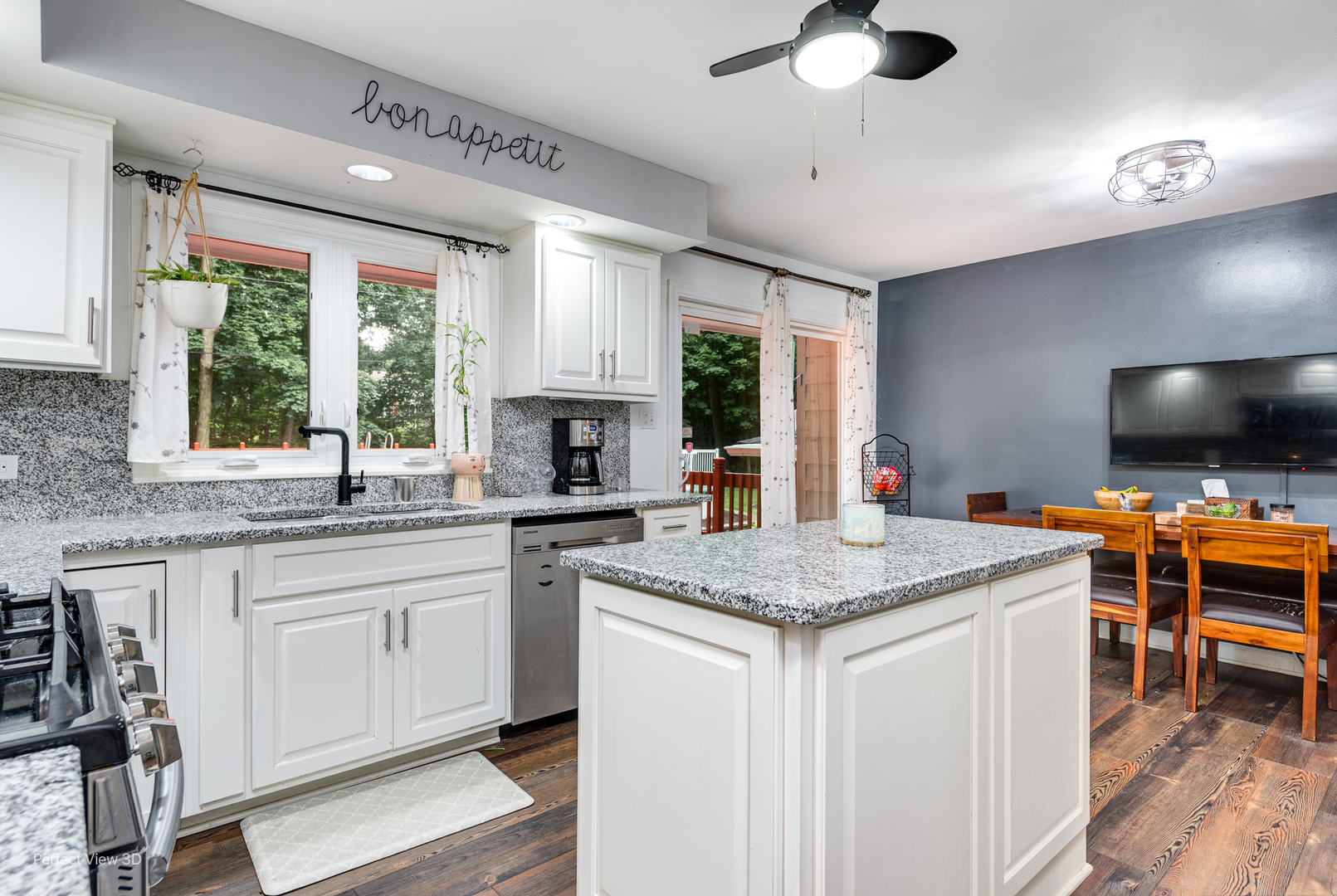 20131 East Brightway Road Mokena, IL 60448 - Photo 7 of 26 a kitchen with stainless steel appliances granite countertop a stove a sink and a microwave
