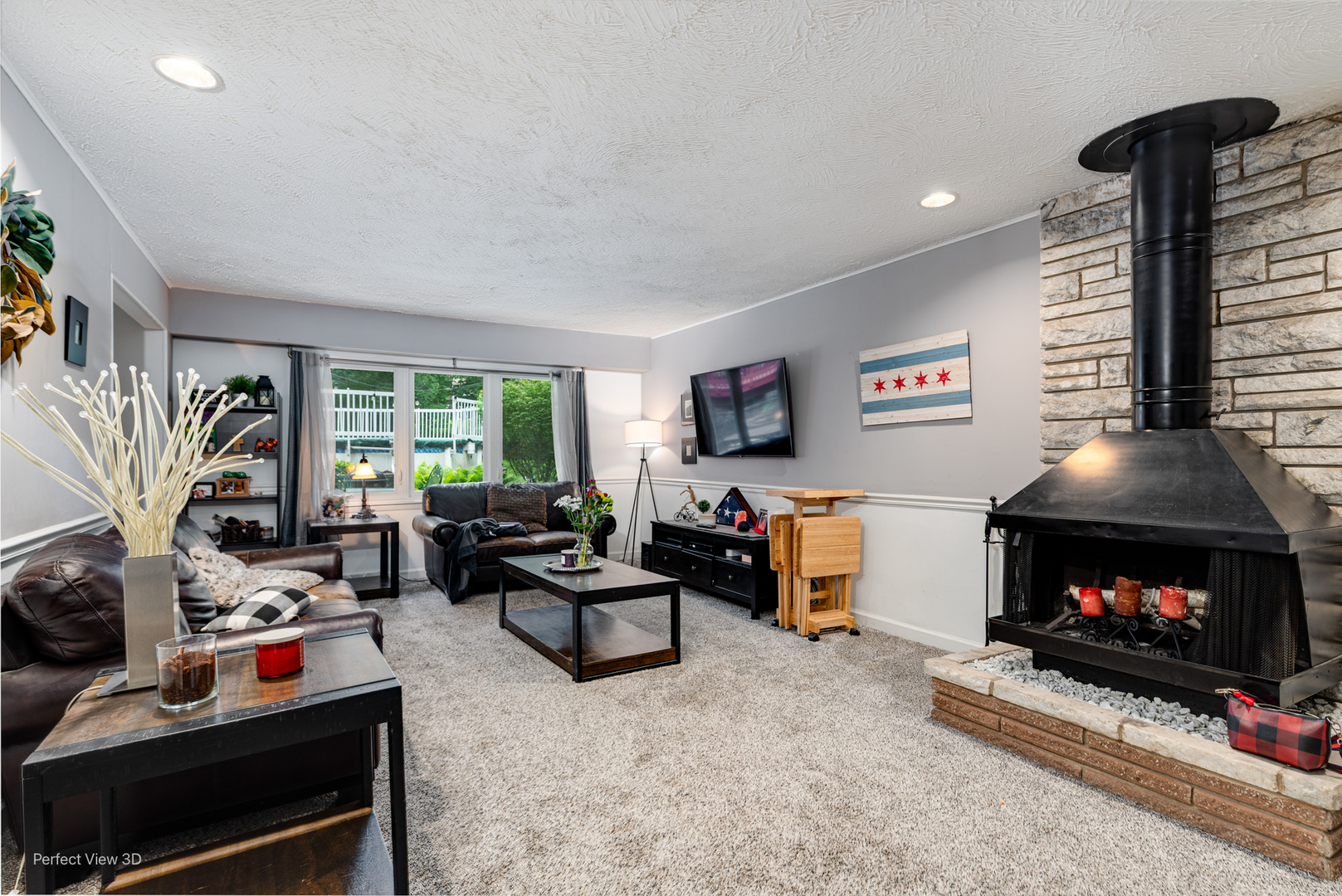 20131 East Brightway Road Mokena, IL 60448 - Photo 9 of 26 a living room with furniture a flat screen tv and a fireplace