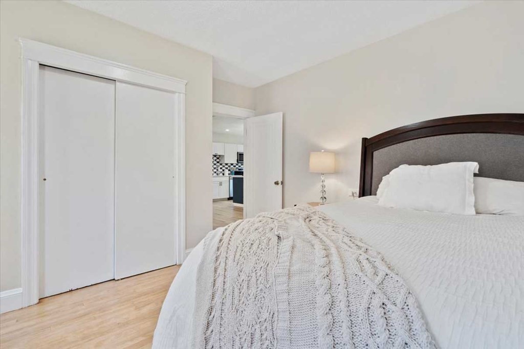 5 Locust Avenue Worcester, MA 01604 - Photo 12 of 40 a bed room with a bed and a mirror