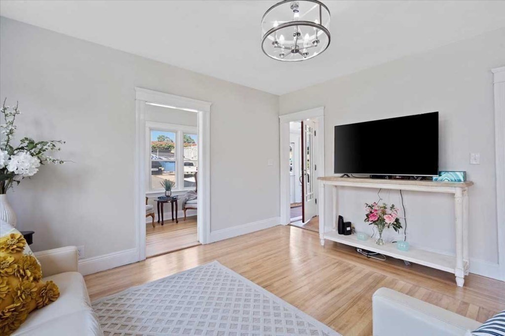 5 Locust Avenue Worcester, MA 01604 - Photo 20 of 40 a living room with furniture and a flat screen tv