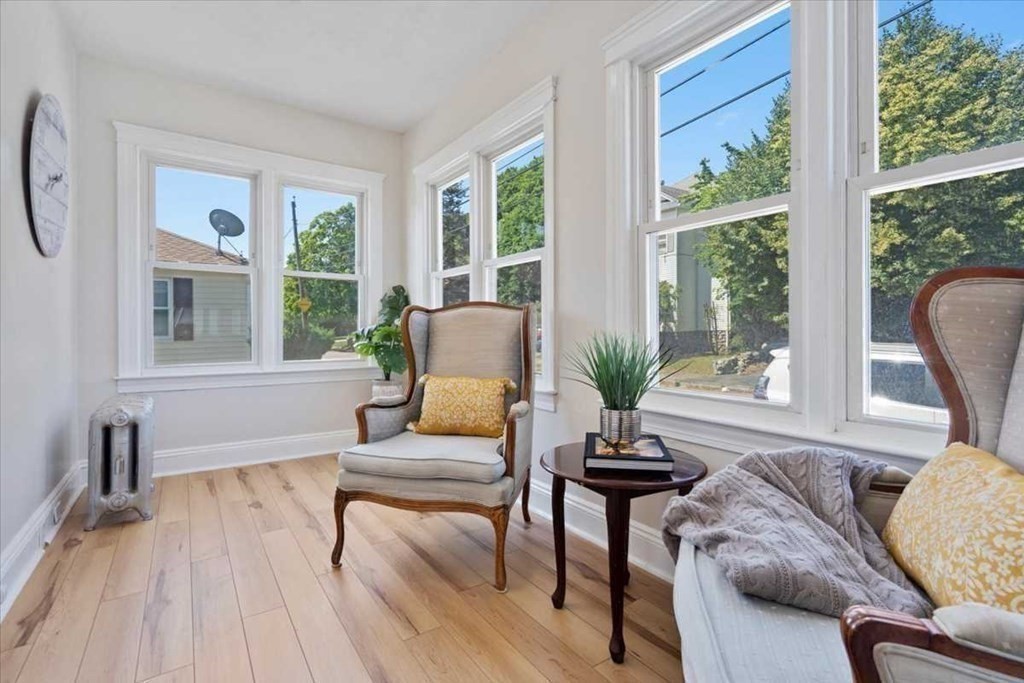 5 Locust Avenue Worcester, MA 01604 - Photo 21 of 40 a living room with furniture and a large window
