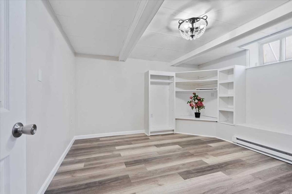 5 Locust Avenue Worcester, MA 01604 - Photo 30 of 40 a view of a livingroom with furniture and hardwood floor