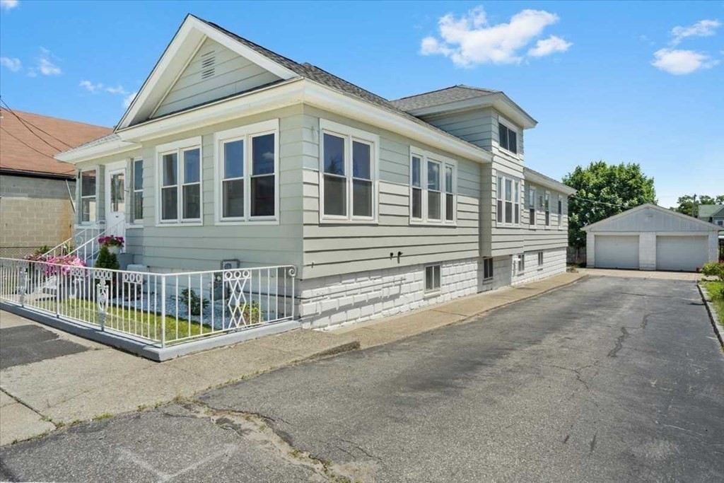 5 Locust Avenue Worcester, MA 01604 - Photo 4 of 40 a front view of a house with a garage