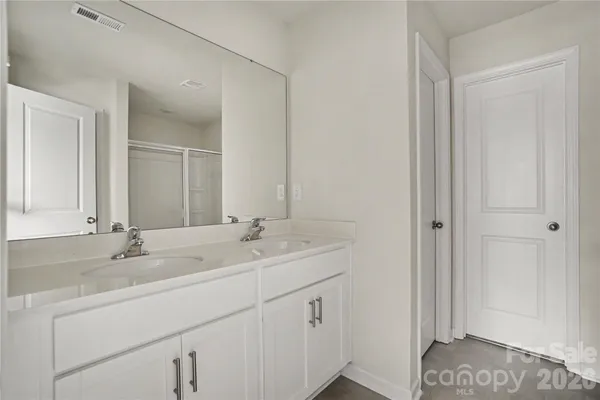 a view of a bathroom with a glass door