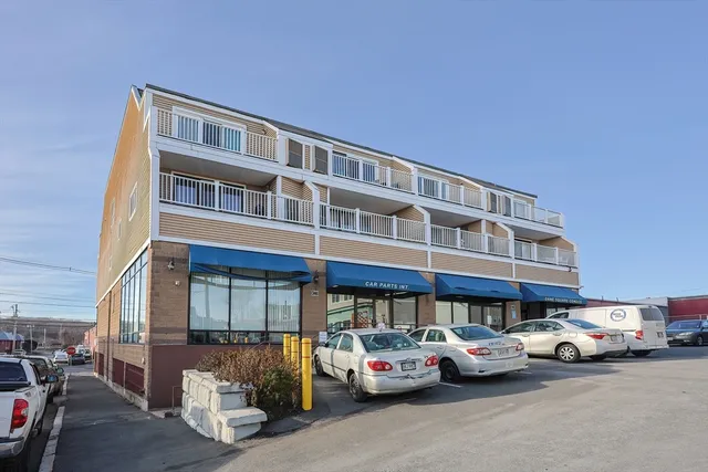 a car parked in front of a building