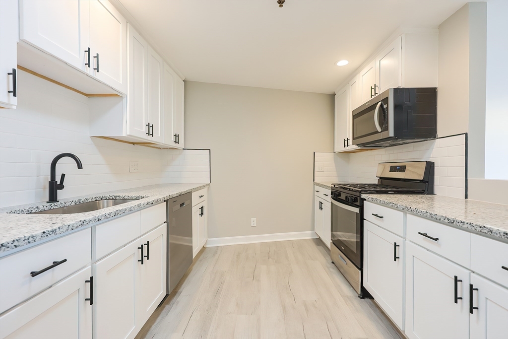 348 Rantoul Street, Unit 202 Beverly, MA 01915 - Photo 4 of 37