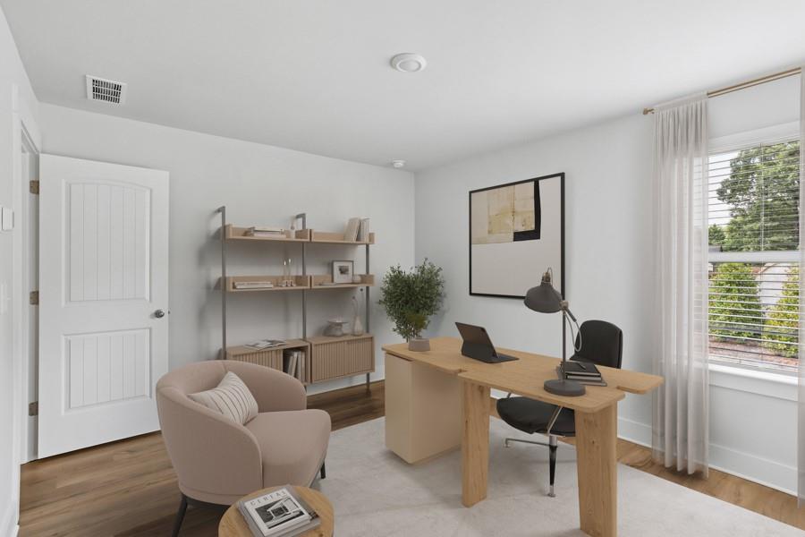 1575 Cedars Road Southeast, Unit MAGNOLIA Lawrenceville, GA 30045 - Photo 13 of 17 a living room with furniture and a window