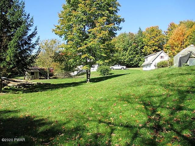 996 Cortez Road Lake Ariel, PA 18436 - Photo 52 of 55 a view of a house with a yard