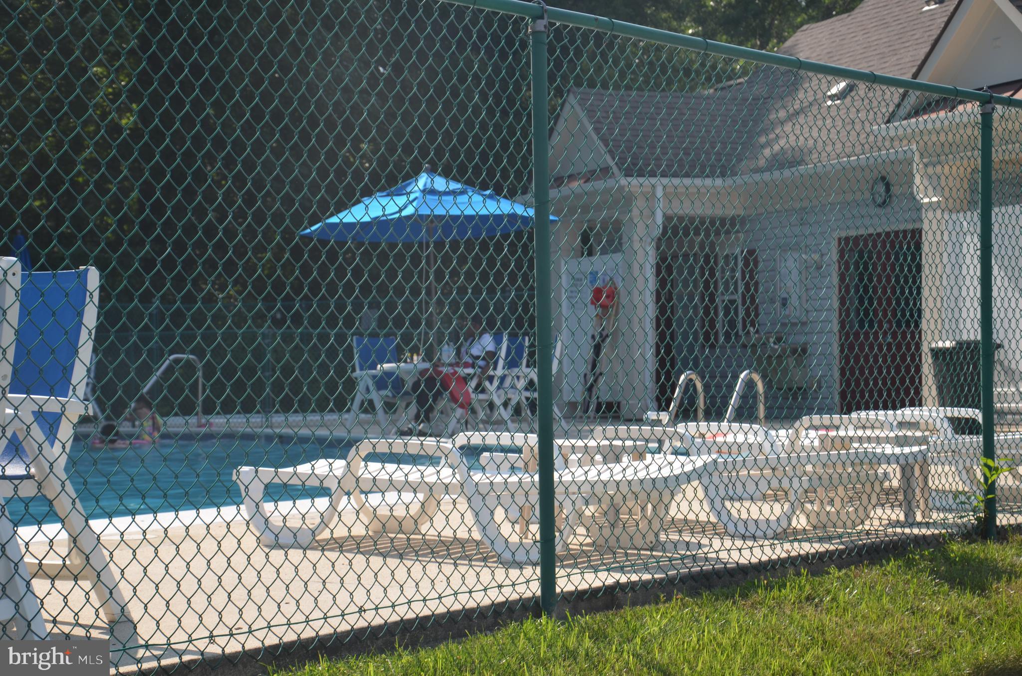 7522 Snowpea Court, Unit 24 Alexandria, VA 22306 - Photo 19 of 19 a side view of a house