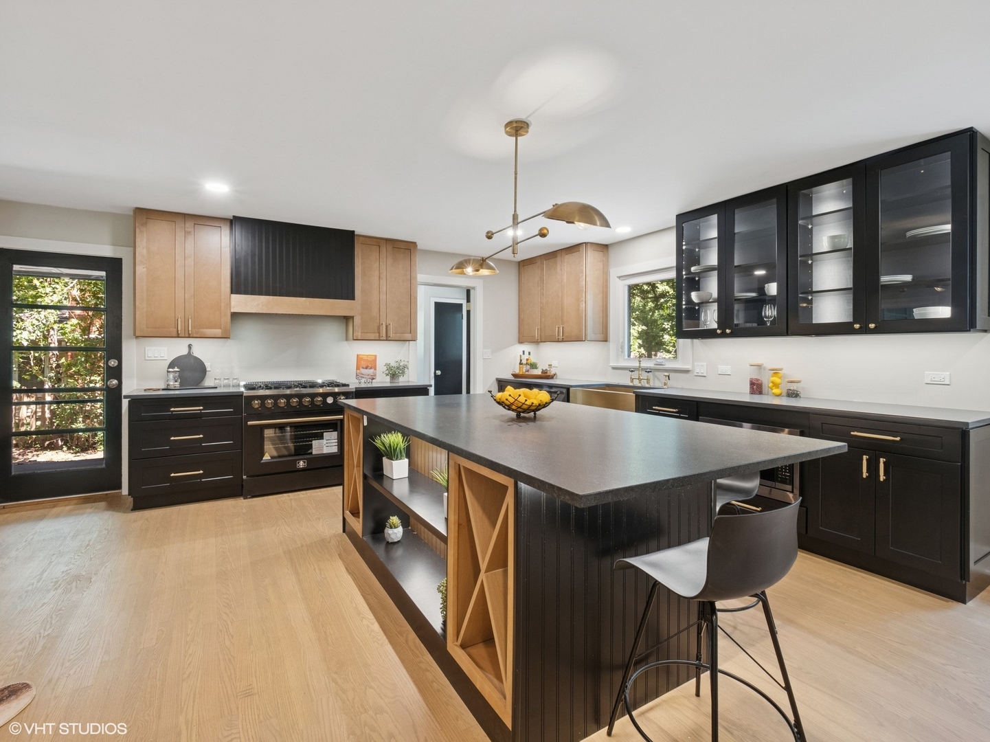600 Eton Drive North Barrington, IL 60010 - Photo 8 of 37 a kitchen with stainless steel appliances granite countertop a sink stove and refrigerator