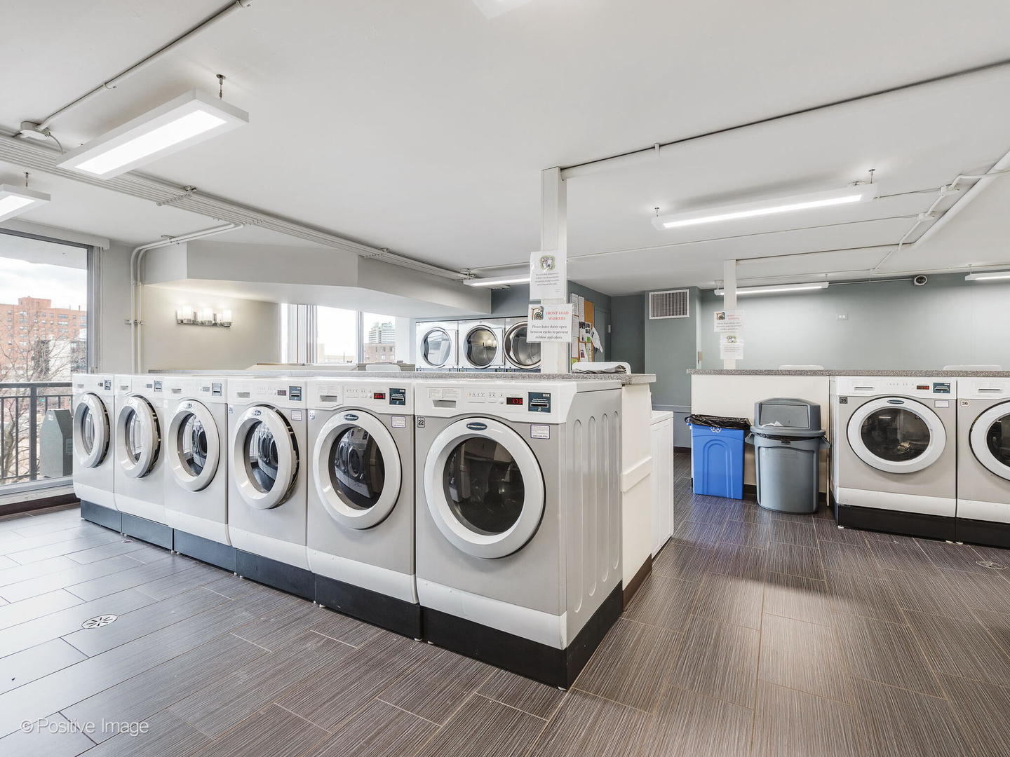 6007 North Sheridan Road, Unit 17G Chicago, IL 60660 - Photo 14 of 18 a utility room with dryer and washer