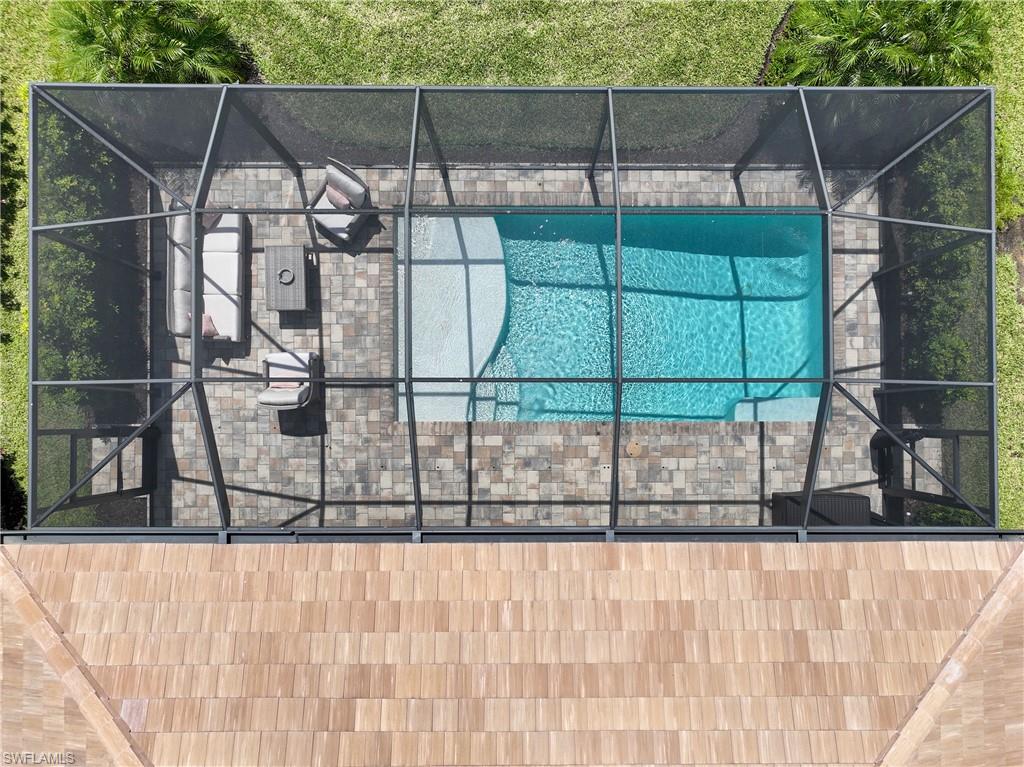 14488 Stillwater Way Naples, FL 34114 - Photo 26 of 36 Bird's eye view of a pool