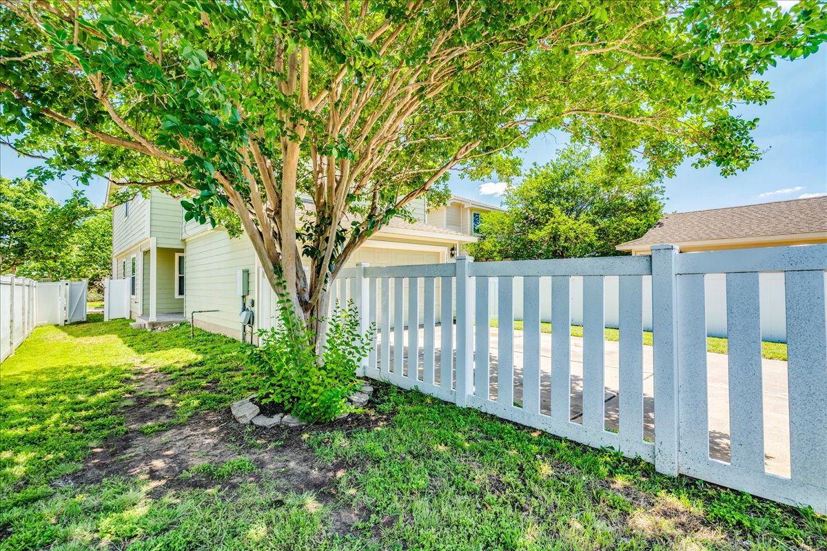1507 Davis Mountain Loop Cedar Park, TX 78613 - Photo 22 of 30 Side yard fenced with a white picket fence