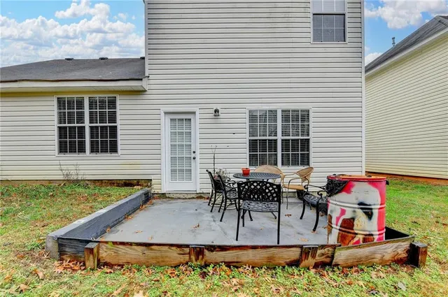 a view of a house with patio