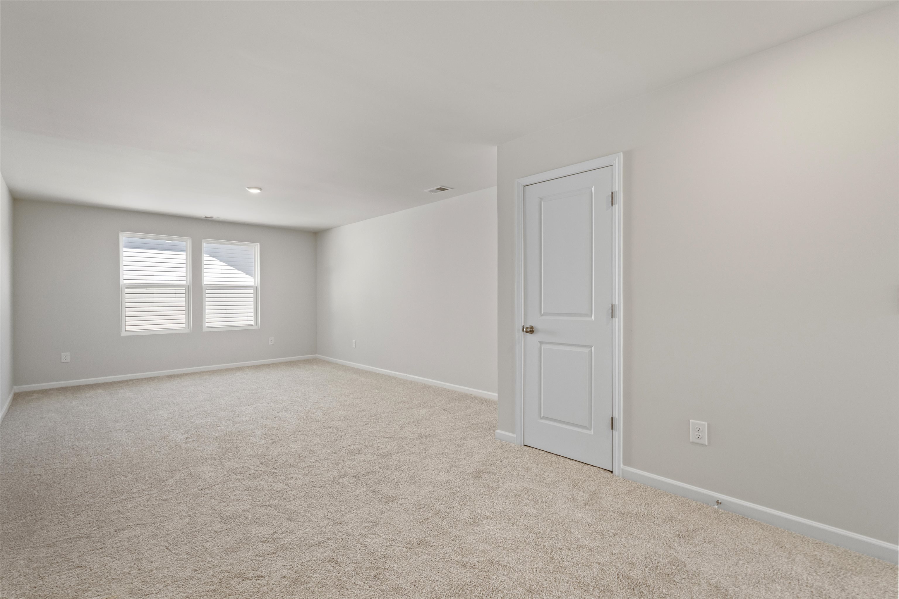 2491 Campton Loop Conway, SC 29527 - Photo 22 of 38 Spare room with baseboards and light carpet