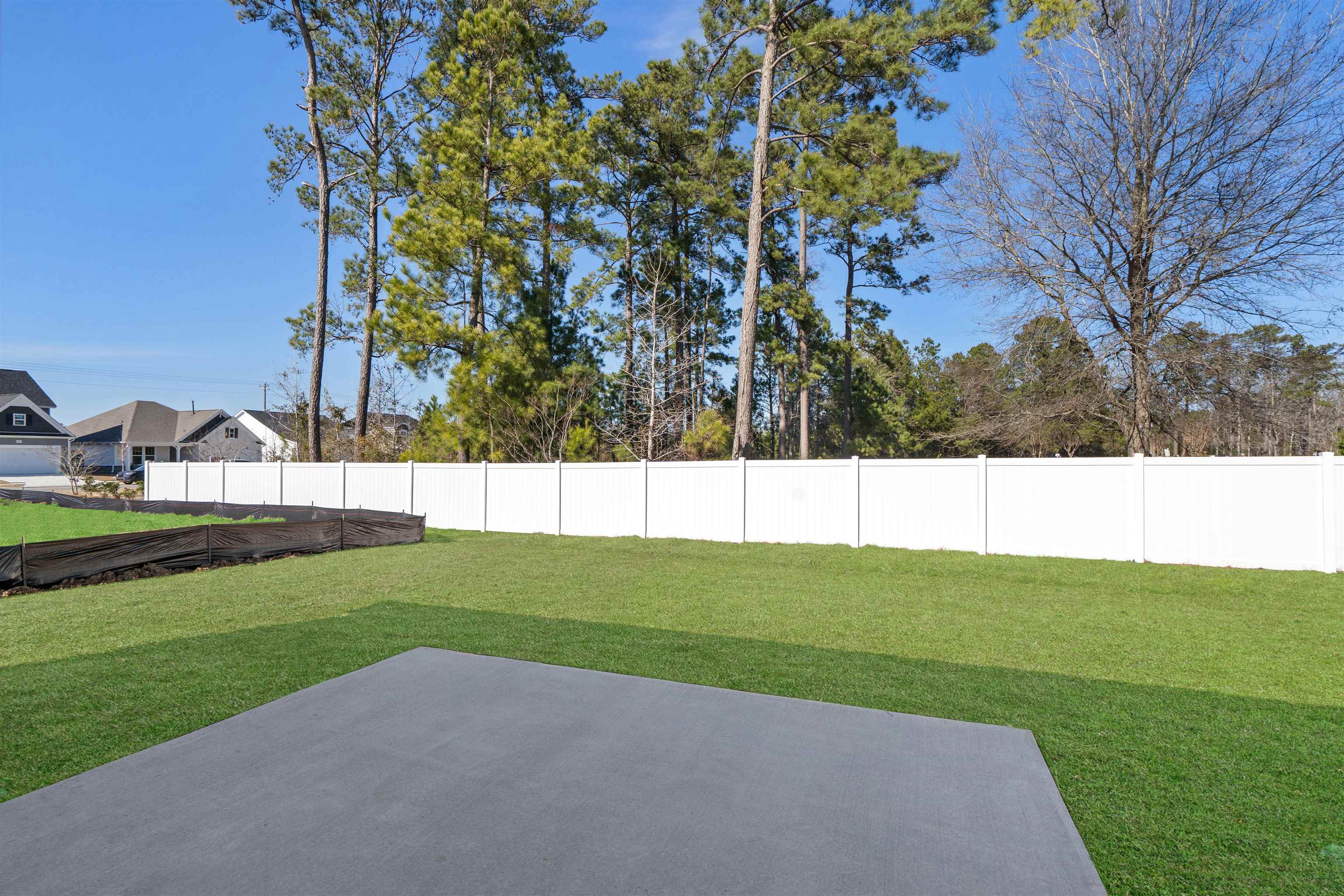 2491 Campton Loop Conway, SC 29527 - Photo 28 of 38 Fenced backyard with a patio area