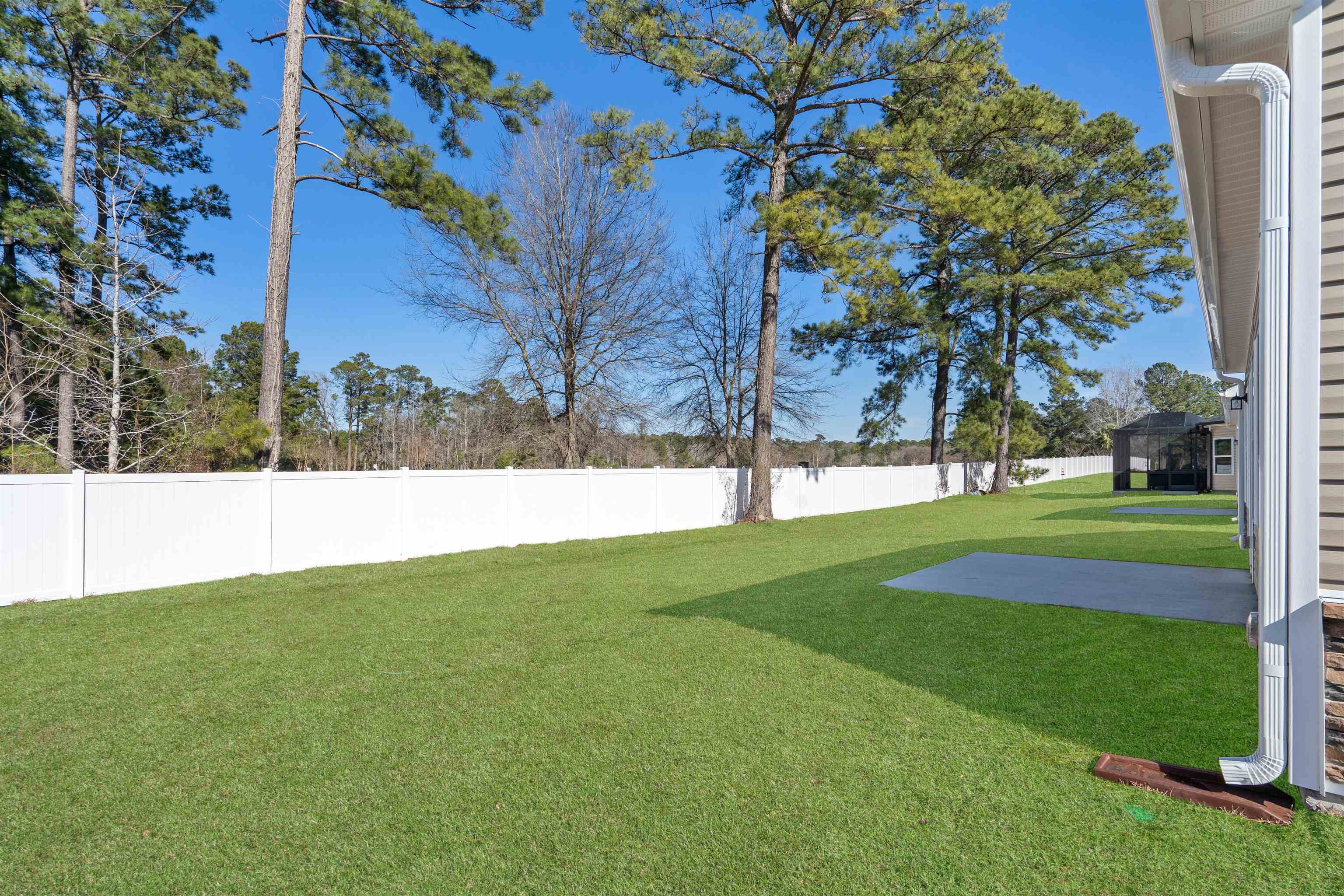 2491 Campton Loop Conway, SC 29527 - Photo 29 of 38 Fenced backyard with a patio area