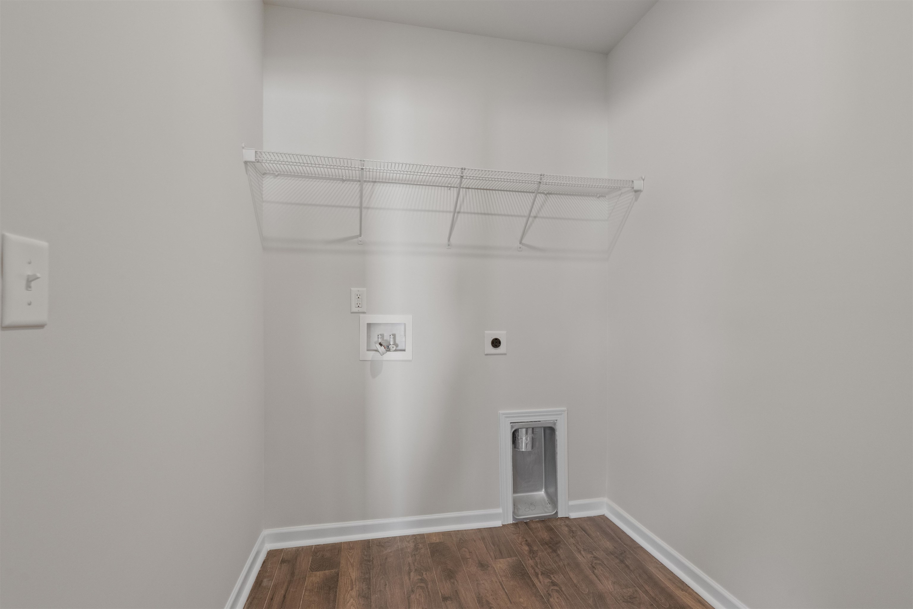 2491 Campton Loop Conway, SC 29527 - Photo 33 of 38 Laundry room featuring dark wood-style flooring, electric dryer hookup, and hookup for a washing machine