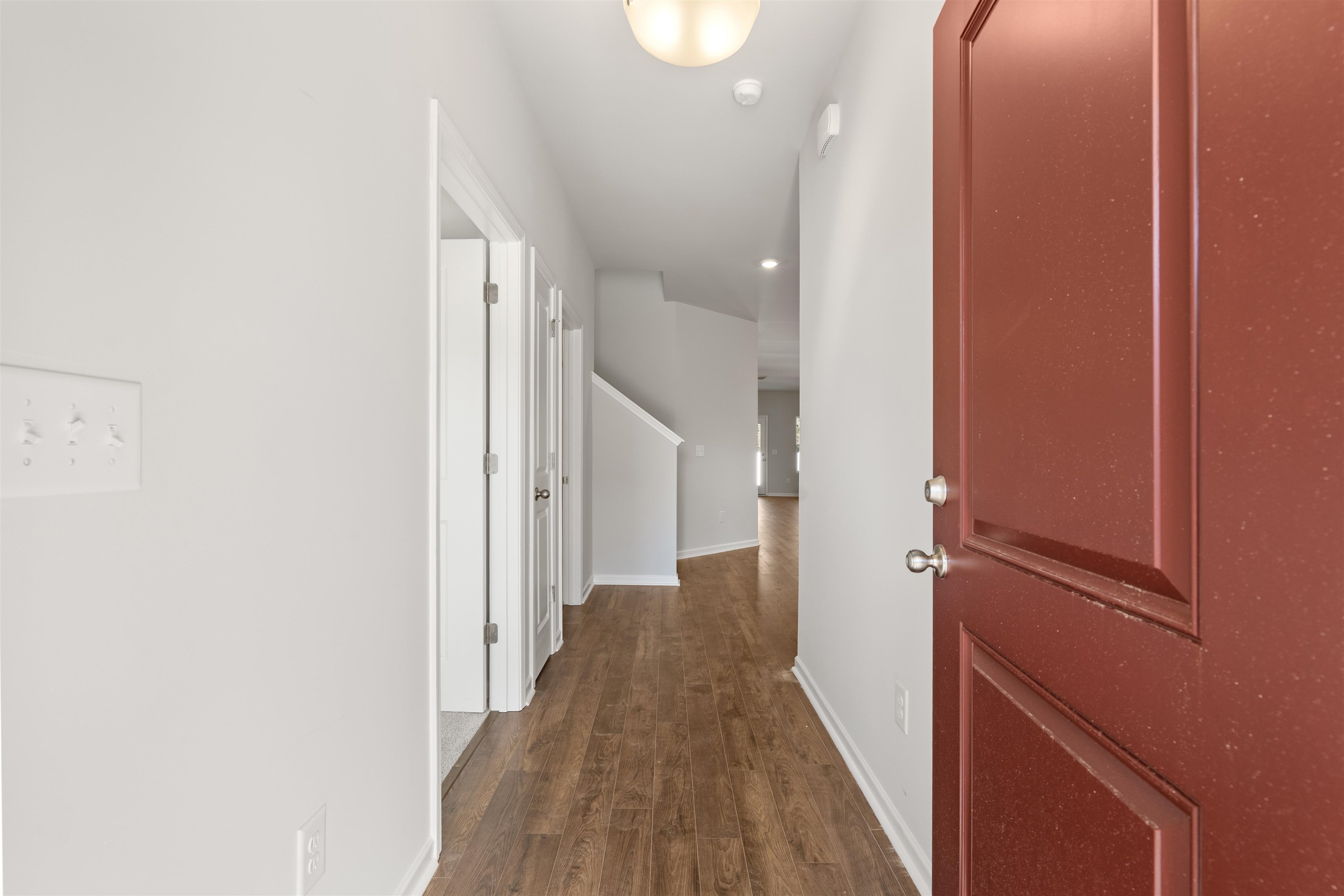 2491 Campton Loop Conway, SC 29527 - Photo 4 of 38 Hall featuring baseboards and dark wood-style floors