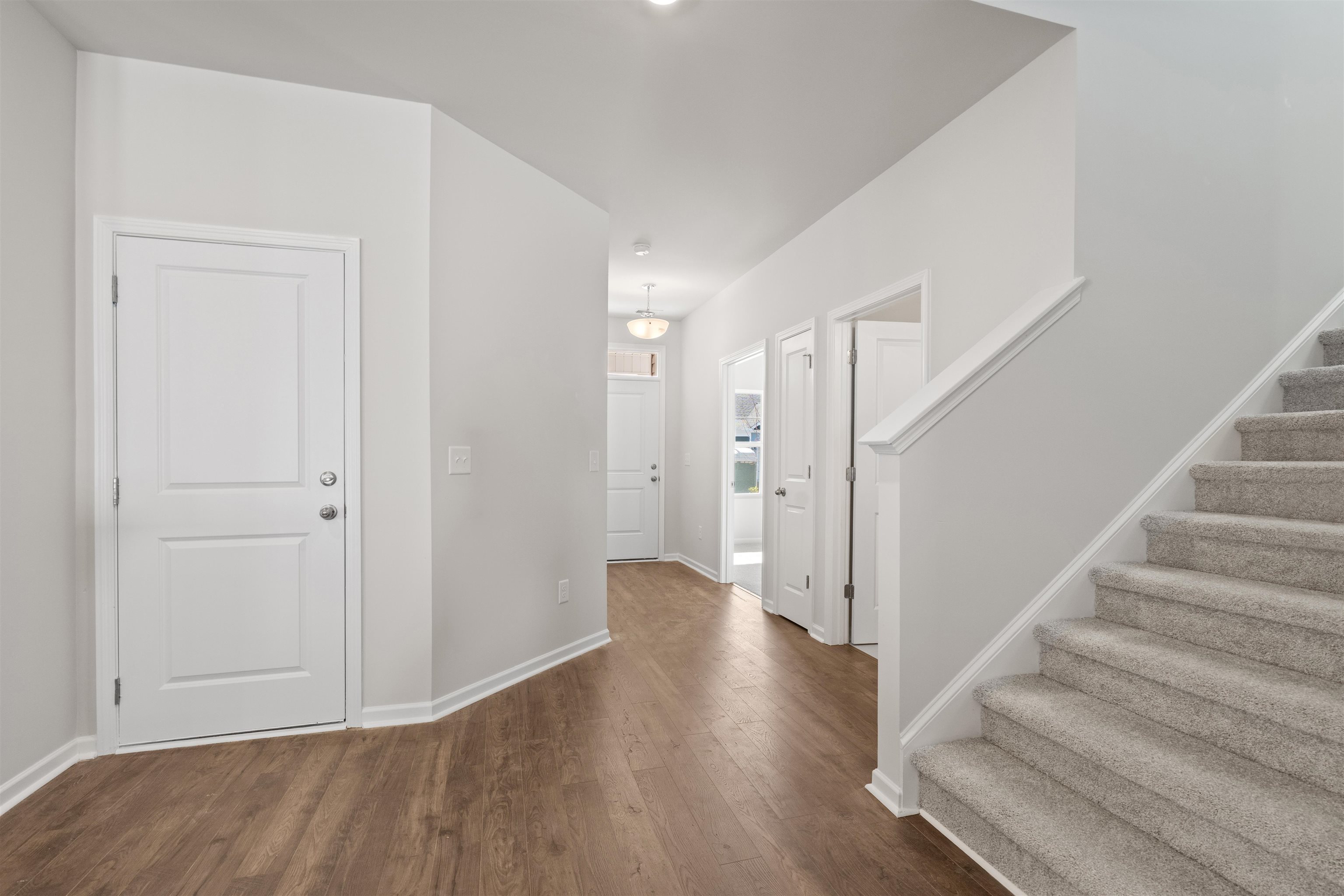 2491 Campton Loop Conway, SC 29527 - Photo 5 of 38 Foyer with dark wood finished floors and stairway