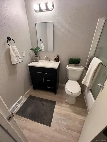 a bathroom with a sink and a toilet
