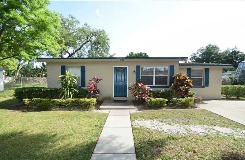 front view of house with a yard