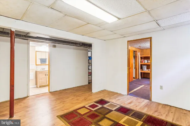 a view of a house with swimming pool and yard