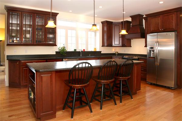 115 A Lakeshore Road Boxford, MA 01921 - Photo 2 of 29 a kitchen with stainless steel appliances granite countertop a table chairs in it and wooden floors