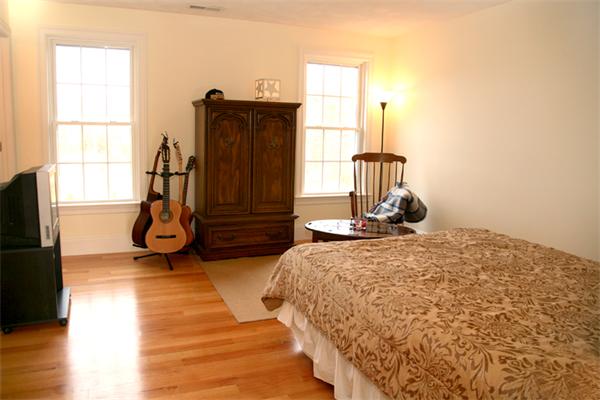 115 A Lakeshore Road Boxford, MA 01921 - Photo 21 of 29 a bed room with a bed and a window