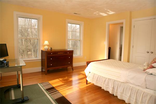 115 A Lakeshore Road Boxford, MA 01921 - Photo 22 of 29 a bedroom with a bed and window