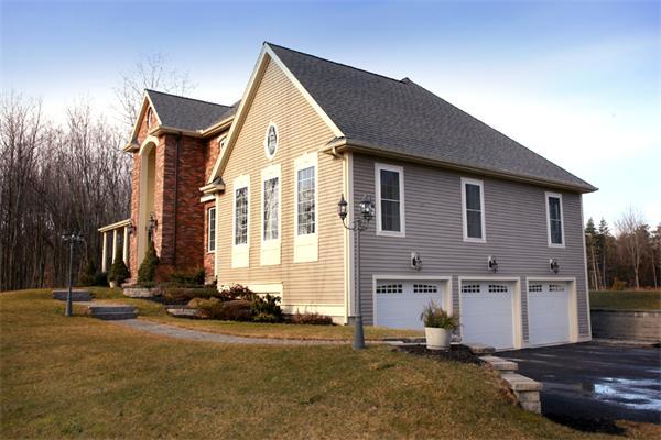 115 A Lakeshore Road Boxford, MA 01921 - Photo 29 of 29 a front view of a house with a yard