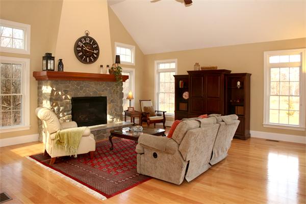 115 A Lakeshore Road Boxford, MA 01921 - Photo 7 of 29 a living room with furniture and a fireplace