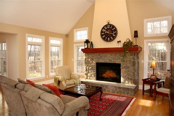 115 A Lakeshore Road Boxford, MA 01921 - Photo 8 of 29 a living room with furniture a fireplace and windows