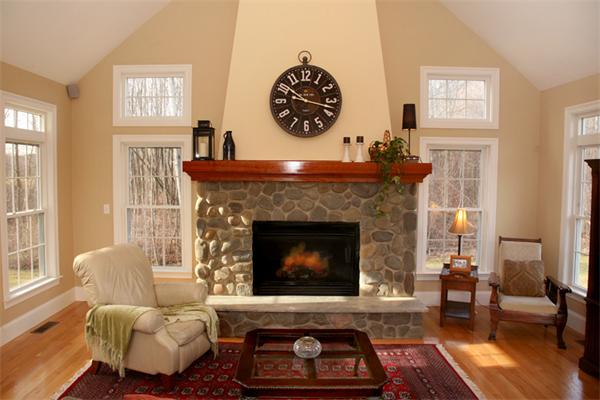115 A Lakeshore Road Boxford, MA 01921 - Photo 9 of 29 a living room with furniture and a fireplace
