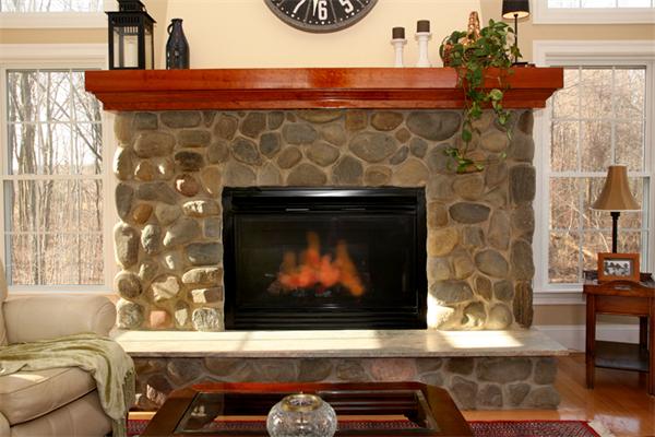 115 A Lakeshore Road Boxford, MA 01921 - Photo 10 of 29 a living room with furniture and a fireplace