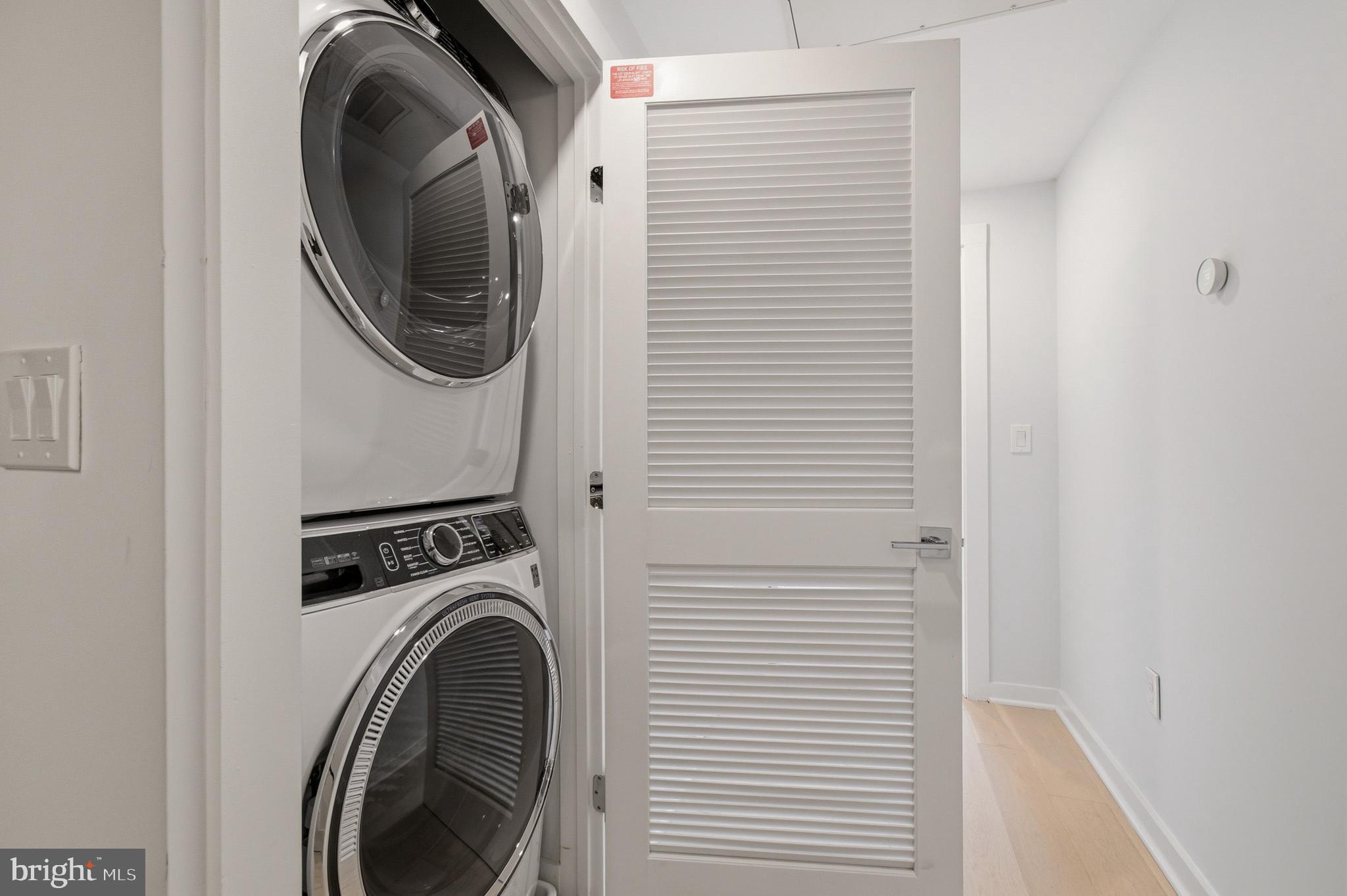 531 Kennedy Street Northwest, Unit 3 Washington, DC 20011 - Photo 13 of 19 a utility room with dryer and washer