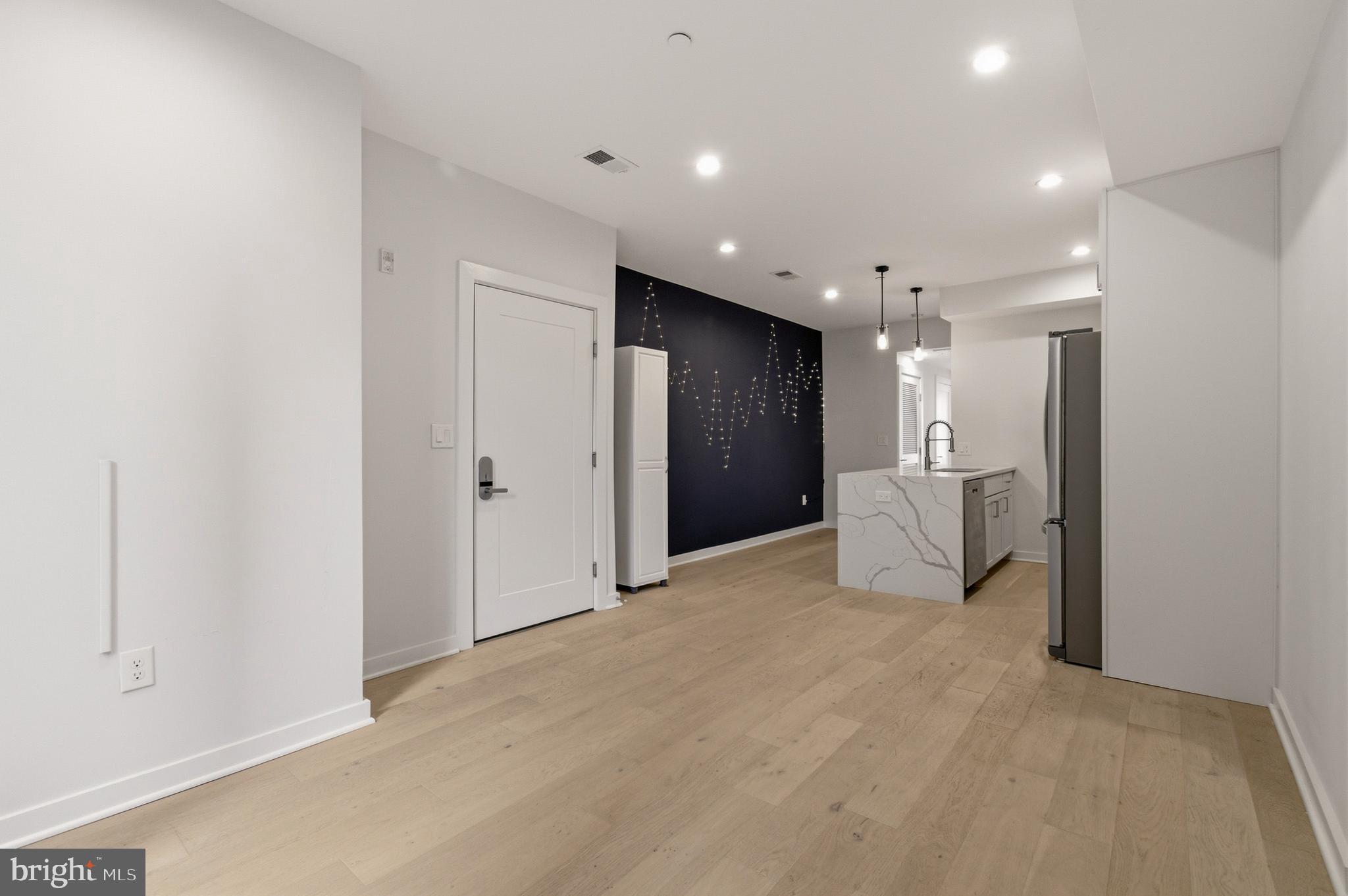 531 Kennedy Street Northwest, Unit 3 Washington, DC 20011 - Photo 5 of 19 a view of a big room with a bathroom