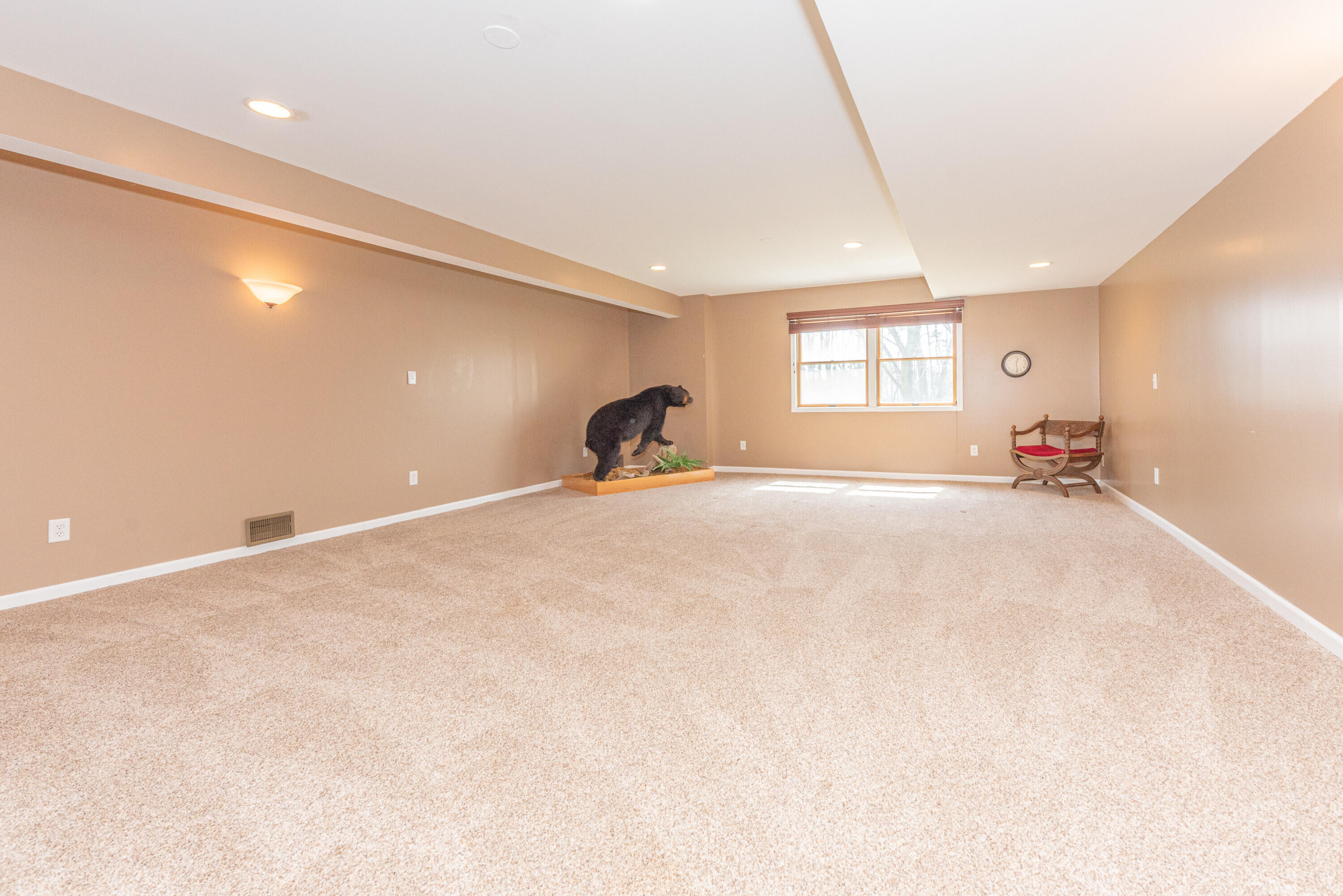 9138 Warner Road Saline, MI 48176 - Photo 41 of 56 41 Basement living room 1