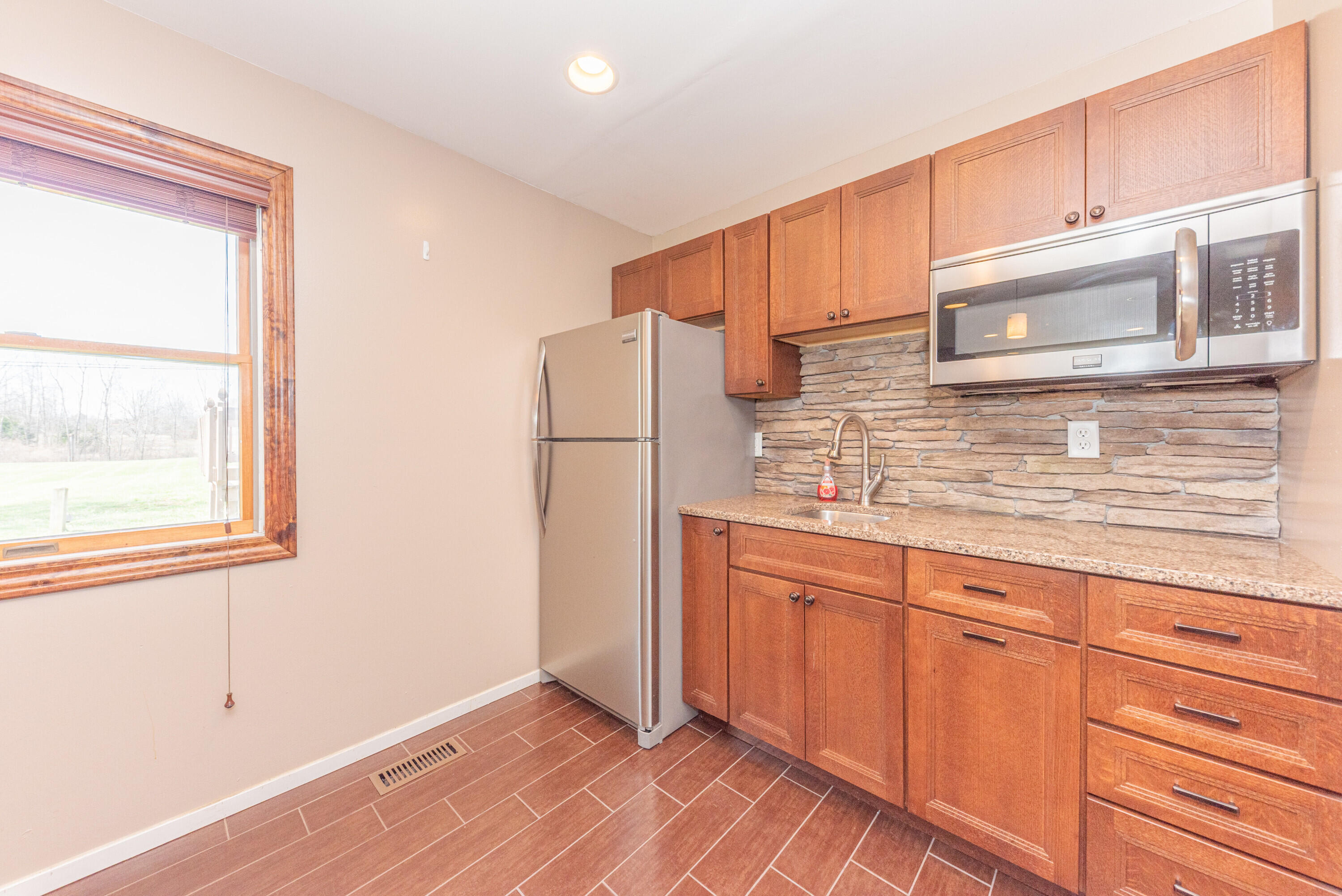 9138 Warner Road Saline, MI 48176 - Photo 44 of 56 44 Basement kitchen 1