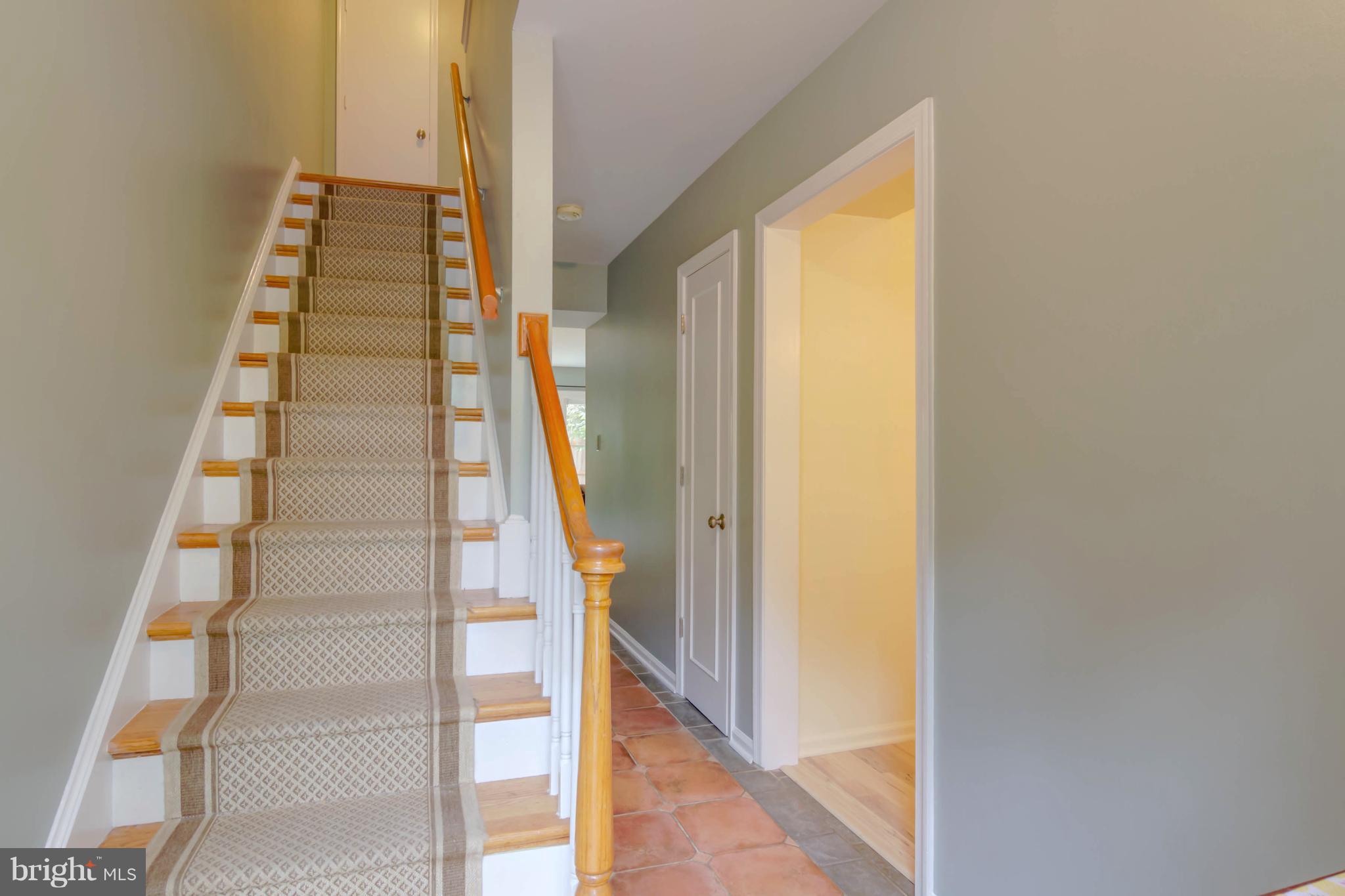 8317 Kingsgate Road, Unit 517 Springfield, VA 22152 - Photo 14 of 30 a view of staircase with railing and white walls